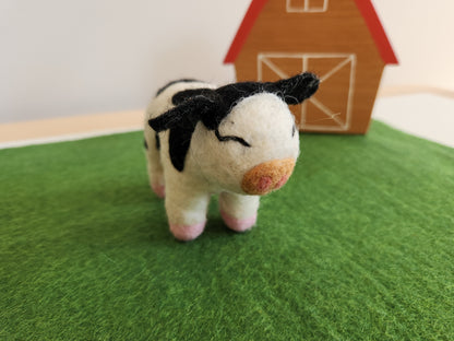 Candice the Calf - Felted Toy Cow on felted paddock playmat