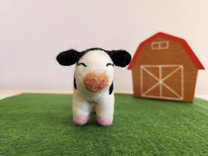 Candice the Calf - Felted Toy Cow on felted paddock playmat with wooden toy barn