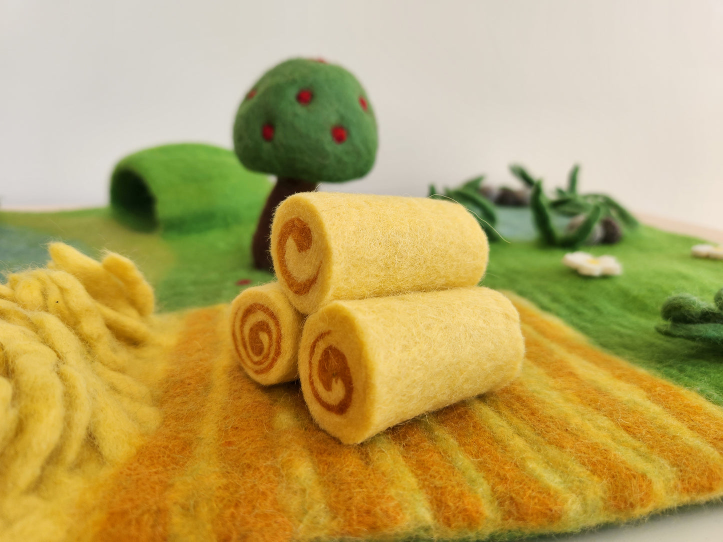 Wool Felt Farmyard Playscape play mat - close up view of felt hay bales