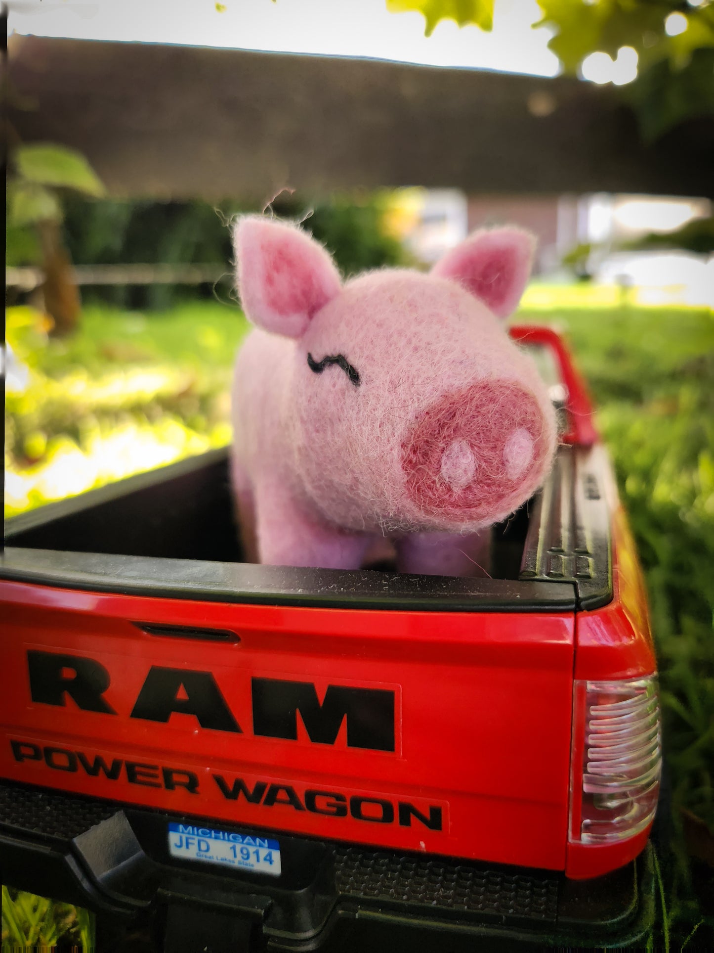 Pippa the Pig - Felt Toy Pig in back of toy ute