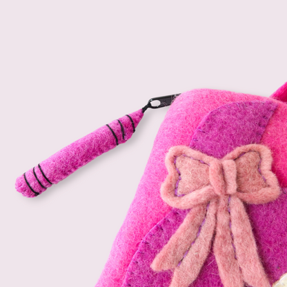 CUTE MONSTER FELTED CRAFT BAG PINK AND PURPLE CLOSE UP VIEW OF CRAYON ZIPPER PULL