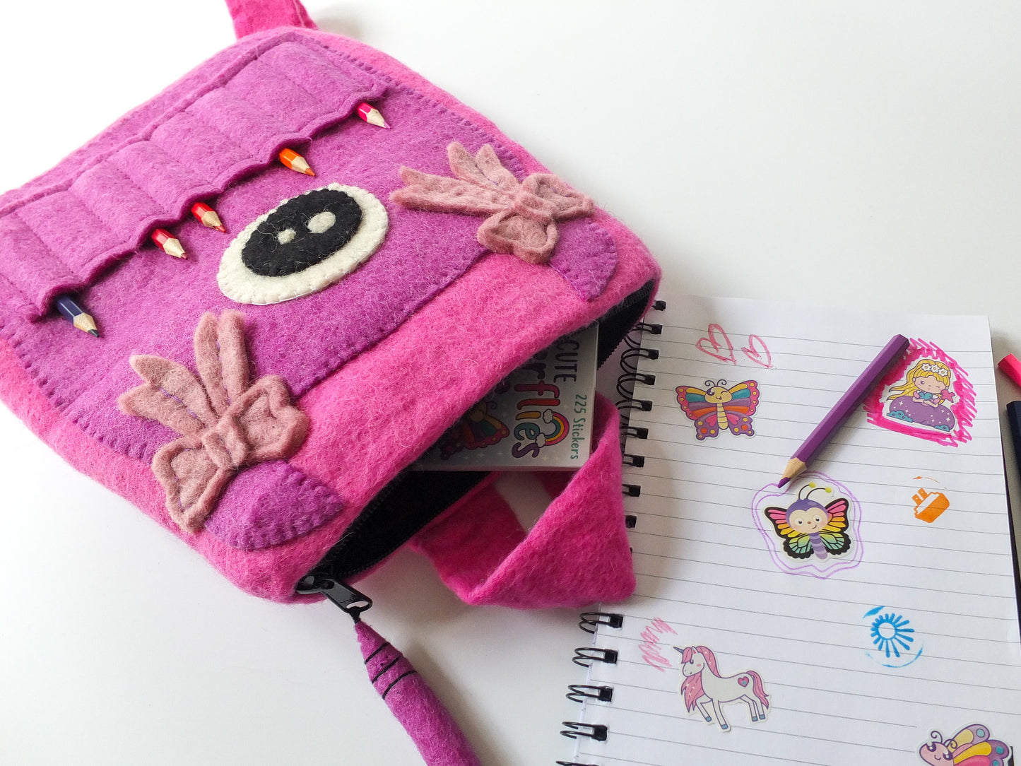 CUTE MONSTER FELTED CRAFT BAG PINK AND PURPLE CRAFT BAG WITH BOOK AND PENCILS