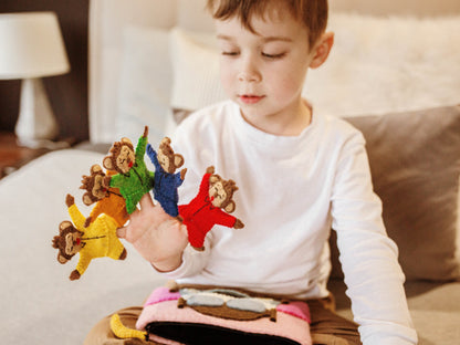 YOUNG BOY PLAYING WITH FIVE LITTLE MONKEYS FELT FINGER PUPPET SET