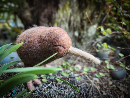 Felt Baby Kiwi Toy standing in native bush