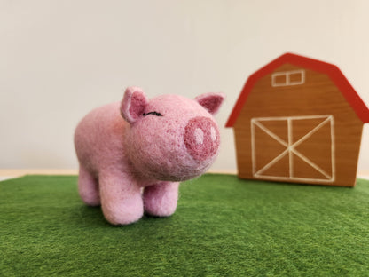 Green felt paddock mat with felt toy pig