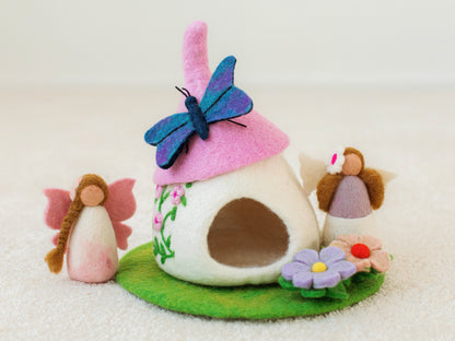 WHITE AND PINK FELT FAIRY HOUSE WITH PINK FLOWER DETAILS AND BLUE BUTTERFLY 