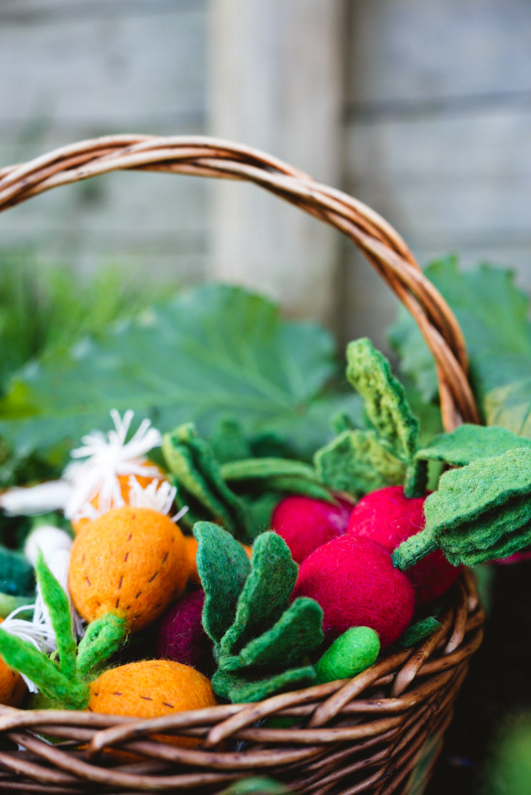 Felted Vegetables in basket outdoors