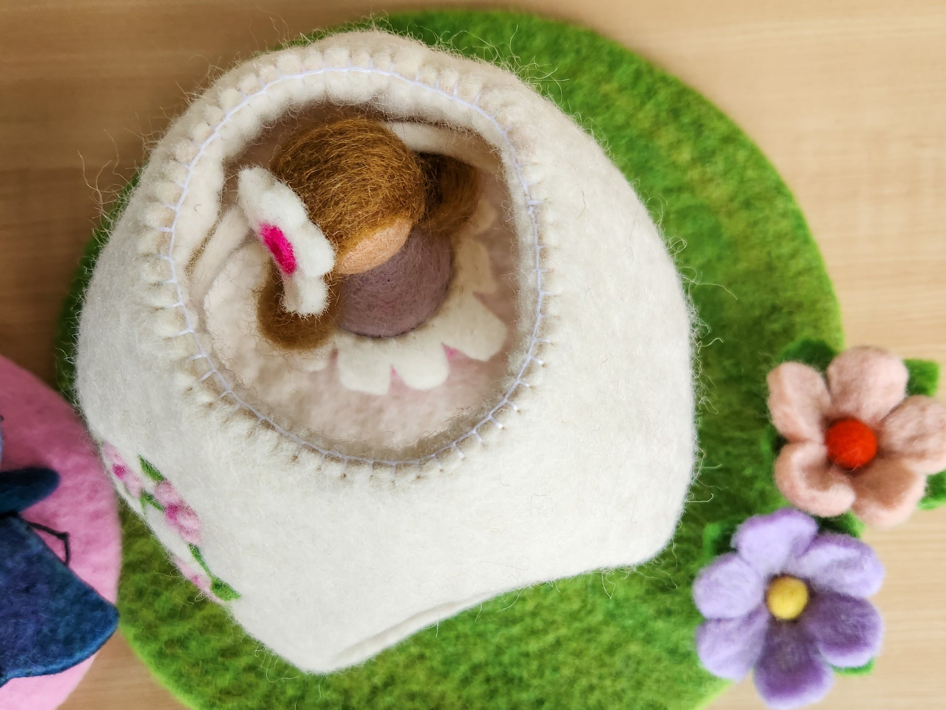 Top view of Felt Fairy House - Pink Meadow Manor and Wild Pink Daisy Fairy